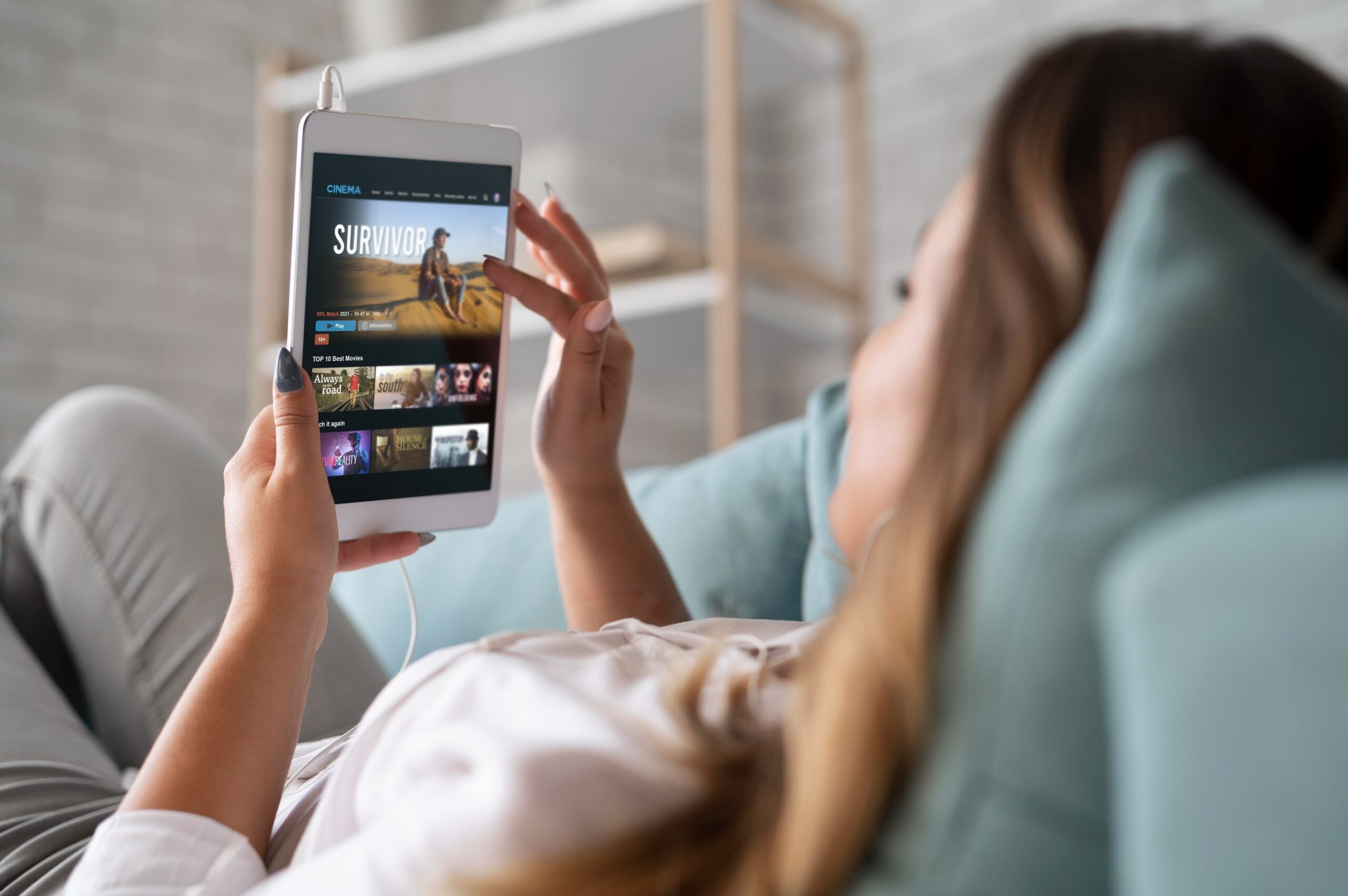 woman using mobile devices to use short drama apps 